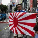 【日本のサッカーファンが街頭応援で旭日旗を掲げる】徐?徳教授が批判